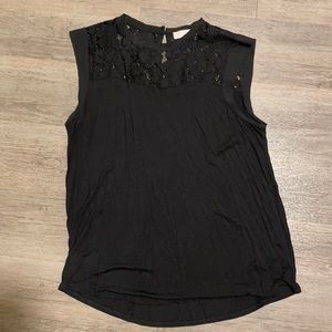 Large black sleeveless loft shirt